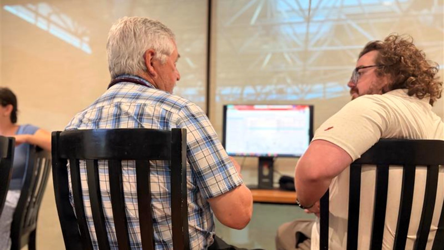 A Freeman physician working through Epic with an Epic trainer at an August Lunch and Learn